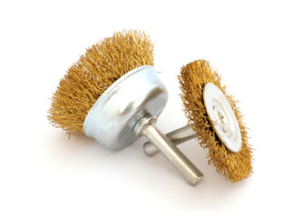 Two crossed wire brushes