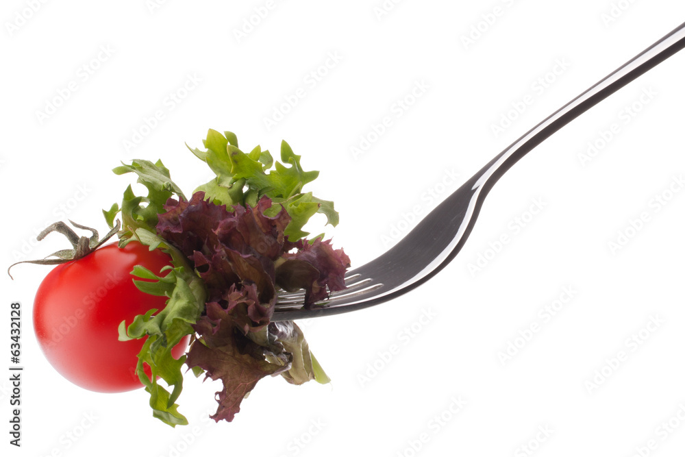 Wall mural Fresh salad and cherry tomato on fork isolated on white backgrou