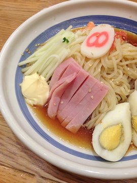 the cold remen with ham and egg in lemon sauce