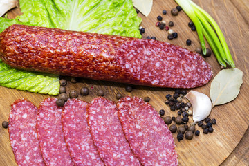 sausage on a wooden plate in a restaurant