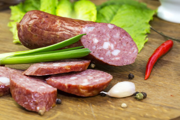 sausage on a wooden plate in a restaurant