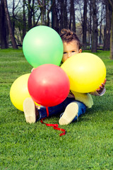 Fototapeta na wymiar Child with balloons