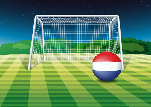 A ball at the field with the flag of Netherlands