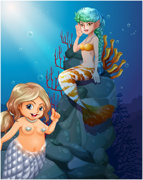 Two mermaids under the sea
