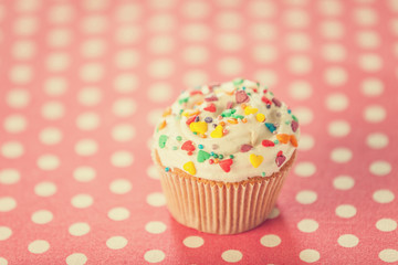 Cream cake on a table.