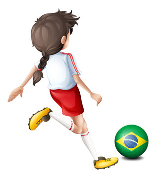 A girl using the soccer ball with the flag of Brazil