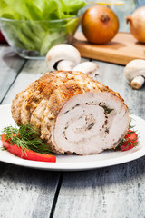 Pork lion roll stuffed with mushrooms