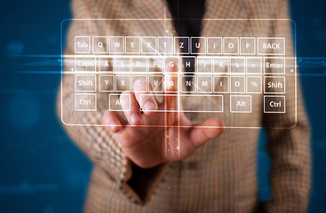 Businessman pressing virtual type of keyboard