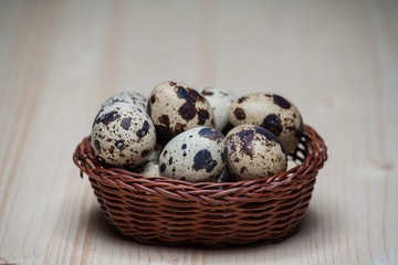 Easter still life with eggs in a basket.