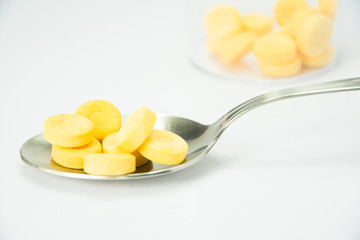 pills on spoon