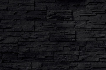 black stone wall background or texture