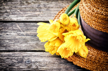 Straw hat with spring flowers