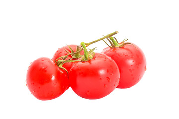 bunch of red tomatoes isolated on a white background
