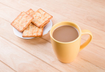Fototapeta na wymiar Coffee cup on the table with bread sticks.