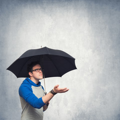 Man with umbrella - obrazy, fototapety, plakaty