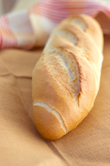 White bread loaf near the napkins