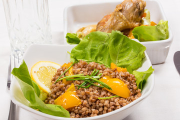 buckwheat with lemon and letuce and fried chicken