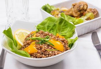 buckwheat with lemon and letuce and fried chicken