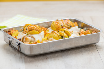 Teglia di seppie ripiene con patate e mele al forno