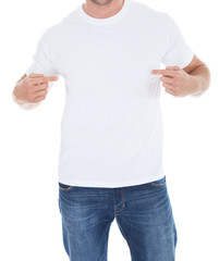 Man pointing at his blank white t-shirt