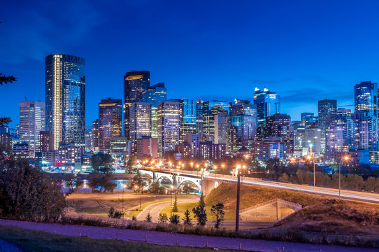 Calgary skyline at night with Bow River
