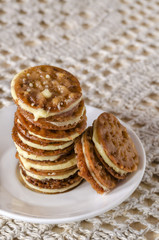 Caramel Florentines cookies on a wooden cutting board