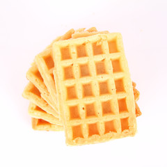 Pile of waffles on a white background