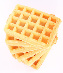 Pile of waffles on a white background