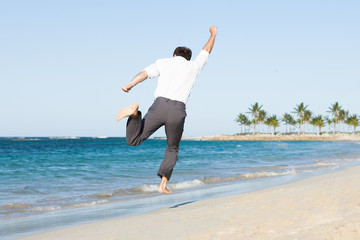 Man Jumping At Beach