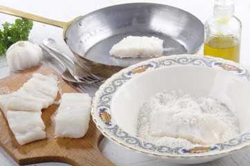 cod filet in flour placed