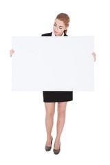 Businesswoman Holding Placard