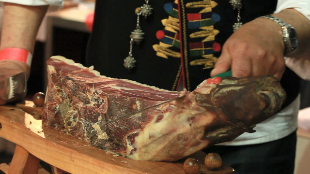 Cutting the Croatian Dry Ham