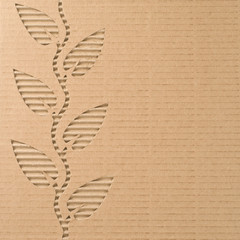 Leaves cut out on a corrugated cardboard