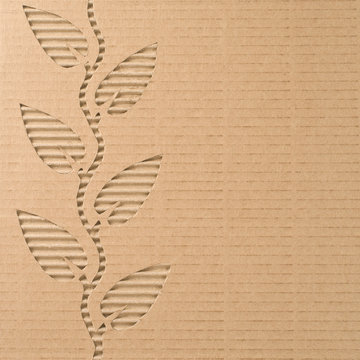 Leaves cut out on a corrugated cardboard