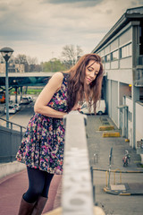 Pretty girl posing in the street