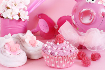 Cupcake and baby decoration in pink color