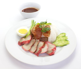 red pork with white rice and sauce