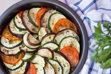 Ratatouille, vegetables cut into slices, eggplant, zucchini