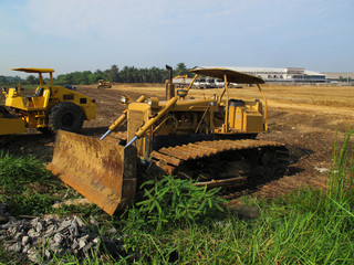 Obraz na płótnie Canvas Machine on Land for Building Business construction Site