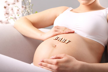 Ciążowy brzuszek - obrazy, fototapety, plakaty