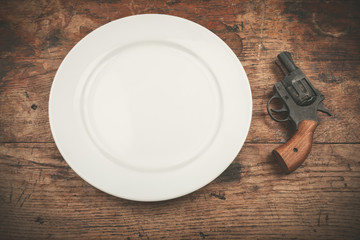 Gun and plate