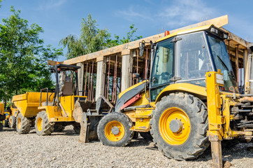 Obraz na płótnie Canvas Construction machinery in a construction site