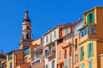 Colorful houses and belfry in Menton, France.