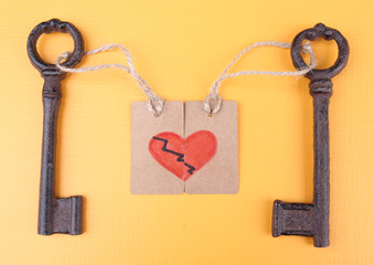 Keys to heart, Conceptual photo. On color background