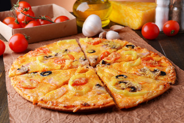 Tasty pizza on table close-up