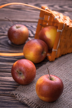 red apples on wooden table, selective focus
