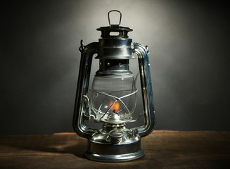 Kerosene lamp on dark grey background