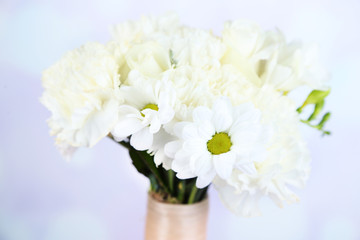 Beautiful wedding bouquet on bright background