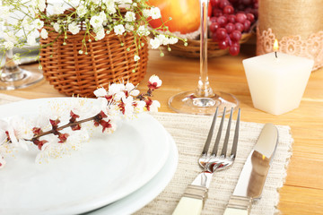 Table setting with spring flowers close up