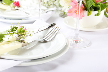 Table setting with spring flowers close up